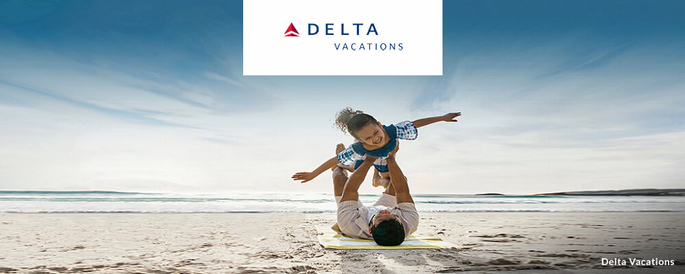 Delta Vacations dad playing airplane with young son. 