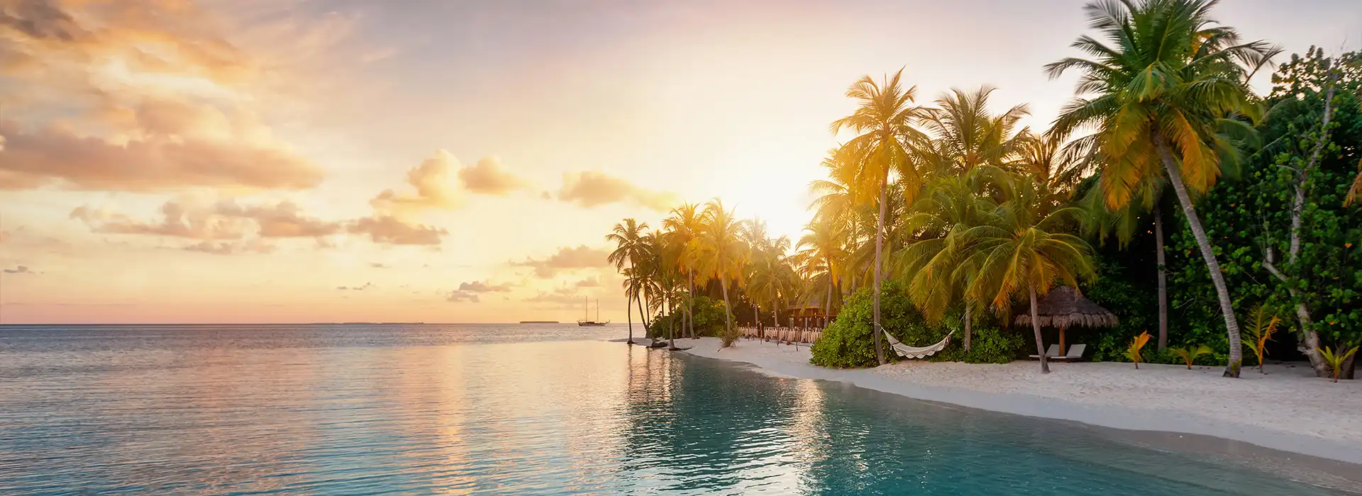 Serene Beach at Sunrise in the Maldives